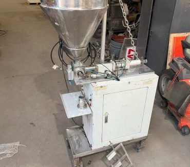 Bottle/Tub Filler with Heated Hopper.